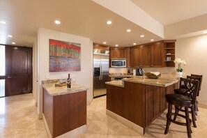 Extremely well stocked kitchen makes meal prep a breeze. Generous counter space for bar seating.