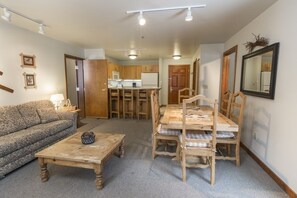 Open living room into kitchen.