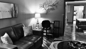Open floor plan featuring pecan wood floors