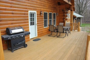 Close up of back deck, gas grill, seating for 8. Beautiful!
