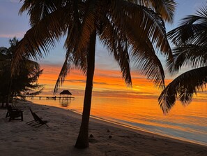 Enjoy stunning sunrises from the decks and your private beach