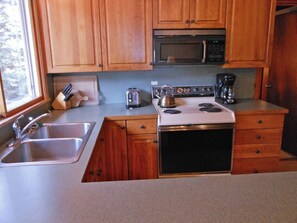 Kitchen is open into the living room.