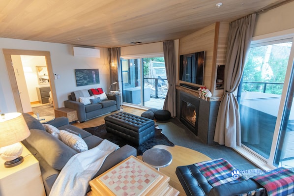 Living area with access to the patio