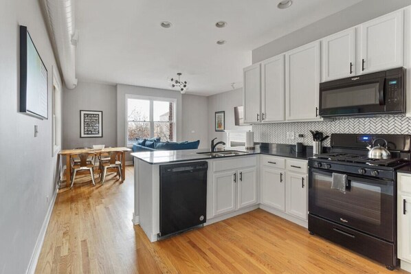 Kitchen, dining area and living space