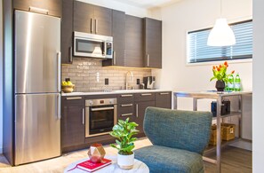 Modern kitchen with barstool seating for two