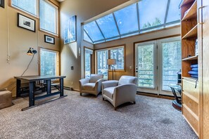 Living room - The living area has access to the balcony with views of the Rocky Mountains
