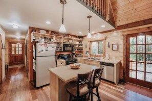 Indoors,Hardwood,Kitchen,Stained Wood,Refrigerator