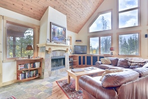 Living Area - Offers natural lighting and views of the timbers and mountains.