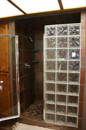 custom granite and slate shower with pristine clean well water filtered