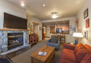 Open living room into kitchen.