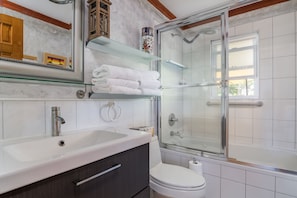Full bathroom with shower and Jacuzzi tub