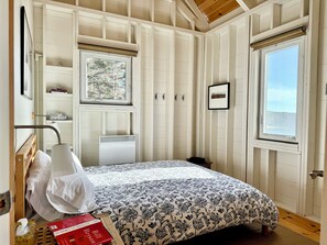 bedroom with Queen bed and ocean views