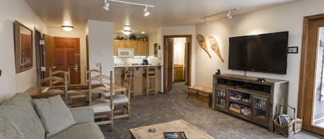 Open living room into kitchen.