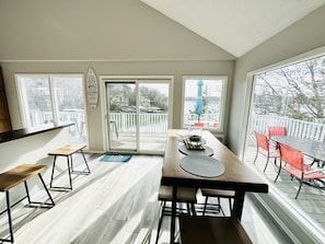 Views from kitchen and easy access to outdoor seating and grills