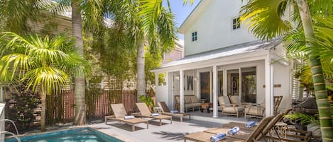 Lovely heated pool with tropical surroundings