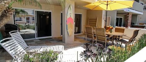 Patio has double sliding doors for easy access to kitchen, dining room, and living room.