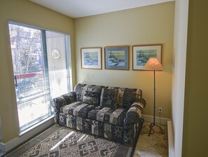 Couch with views out onto the patio