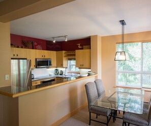 Open plan living, dining and kitchen area