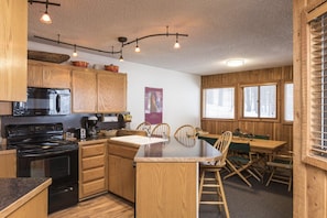 Kitchen into dining room.