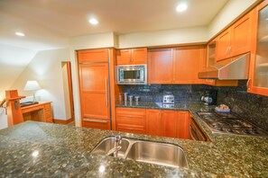 Bright kitchen with granite countertops