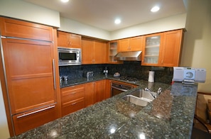 Bright kitchen with granite countertops