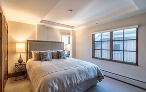 Master bedroom with a king bed and en suite bathroom
