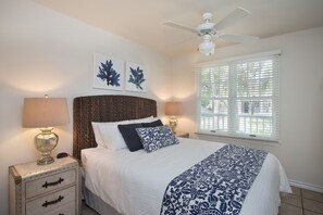 Cuddle up in this comfy queen bed with fresh updated linens.