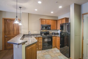 Kitchen - Plenty of counter space with newer upgrades.