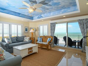 Comfortale living room with a view of the beach.