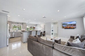 Relax in the living area, featuring comfortable furnishings. 