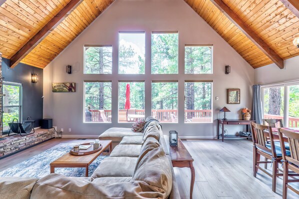 open floor plan with views of the pines