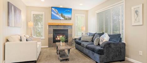 Cozy family room with fireplace and TV