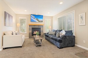 Cozy family room with fireplace and TV