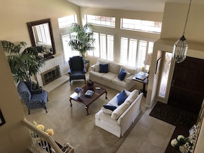 Vaulted ceiling living room. Gas fireplace