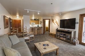 Open living room into kitchen.