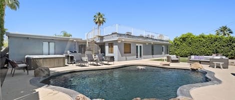 Pebble Tech pool with waterfall. 
