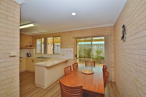 River Retreat - Kalbarri Accommodation Service - Second dining area and kitchen, back patoio access