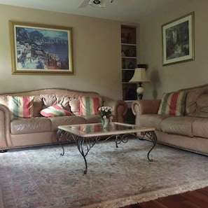 Leather Sofas and fine decor welcome you home to Black Bear Retreat.