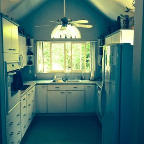 The Kitchen is well equipped with high end appliances great picture window.