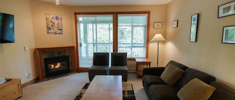 Bright living room with access to the patio