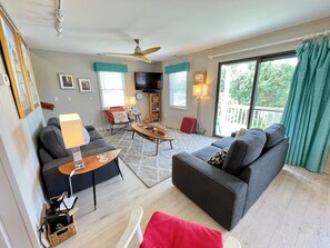 Living Area with, TV, First Floor with Deck Access