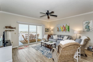 Beautiful 2 BR condo with glorious sunset views from your private balcony located in the heart of Pensacola Beach across the street from both the sugar white sand beach, and emerald waters of Pensacola Beach, and The Pensacola Beach Boardwalk where you can dine, shop, and unwind!