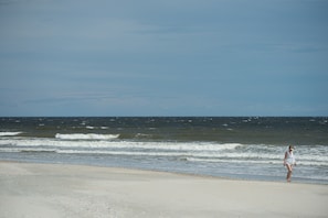 Beach in front of house