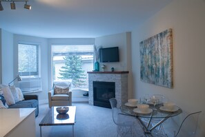 Living and dining area with fireplace