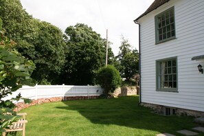 Front garden. Also has picnic benches for eating or socialising