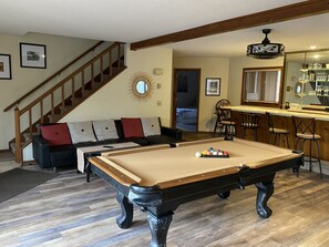 The family room that highlights our latest addition - an 87” pool table!
