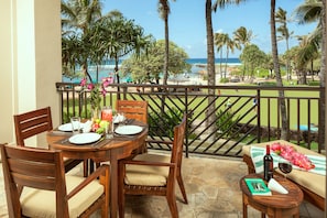 Ocean and beach view lanai! - Watch the whales breach from your lanai with dining table, chaise lounge and end table!