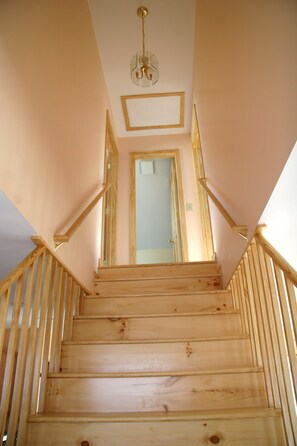 stairs to bedrooms with bathroom at top of stairs