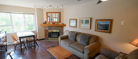 Living and dining area with fireplace