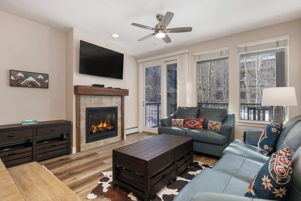 Gas fireplace, access to the private balcony, and a queen size sofa sleeper.